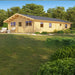 GardenHouse24 USA Sean 44 Garden Room is shown in a wide-angle view from the front left corner, highlighting its long rectangular design, wooden cladding, multiple windows, and a black metal roof surrounded by gre