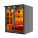 Seen from the front right, Golden Designs 6 Person Full Spectrum Near Zero EMF Far IR Sauna Black Edition shows its black exterior, sliding glass doors and lit benches inside