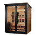 Seen from the front right, Golden Designs Loviisa 3 Person 2 Tone Barn Hybrid Outdoor Sauna shows its cedar side wall, black trim and guarded stove inside