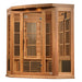 Seen from the right, Golden Designs Maxxus Avignon 3 Person Corner Near Zero EMF Far Infrared Sauna in Red Cedar shows its red cedar corner walls, glass door and slatted heater covers
