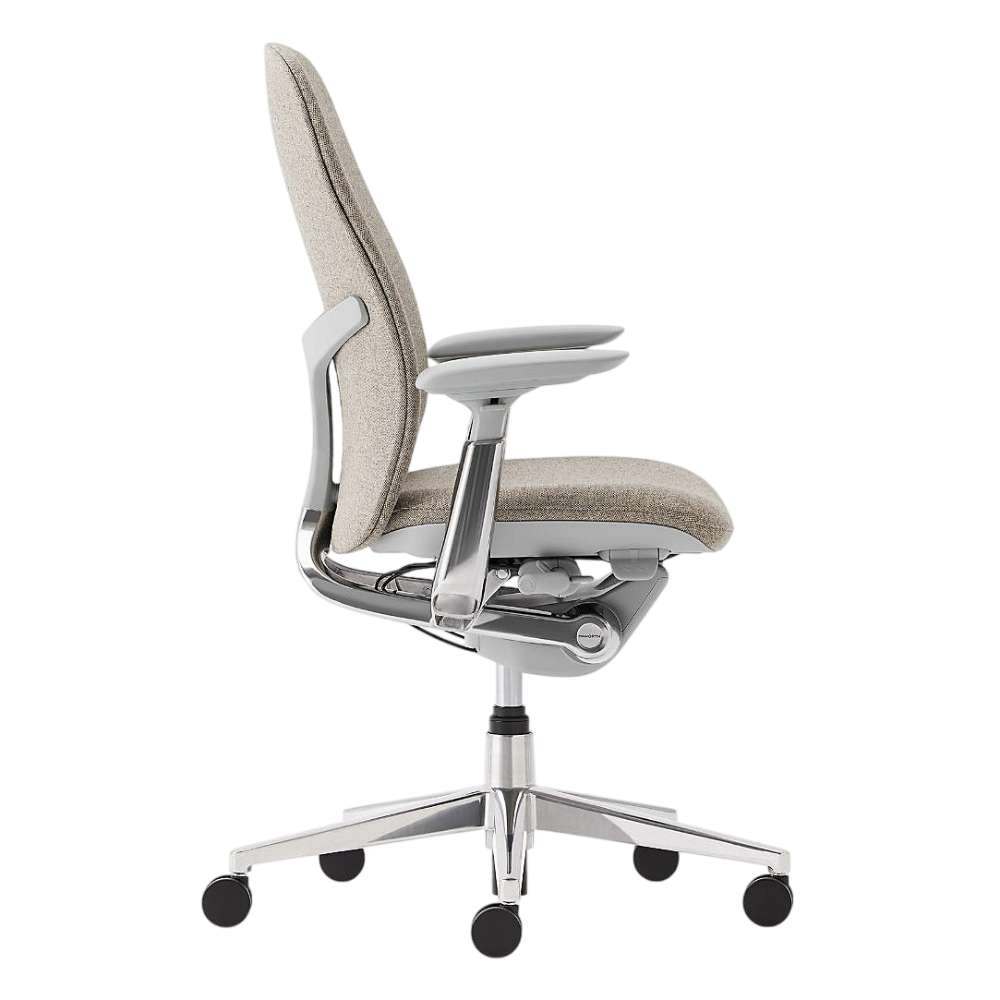Seen from the side, Crate & Barrel Haworth Zody Upholstered Stone Office Chair displays its slim silhouette, ergonomic backrest, and five-wheel base