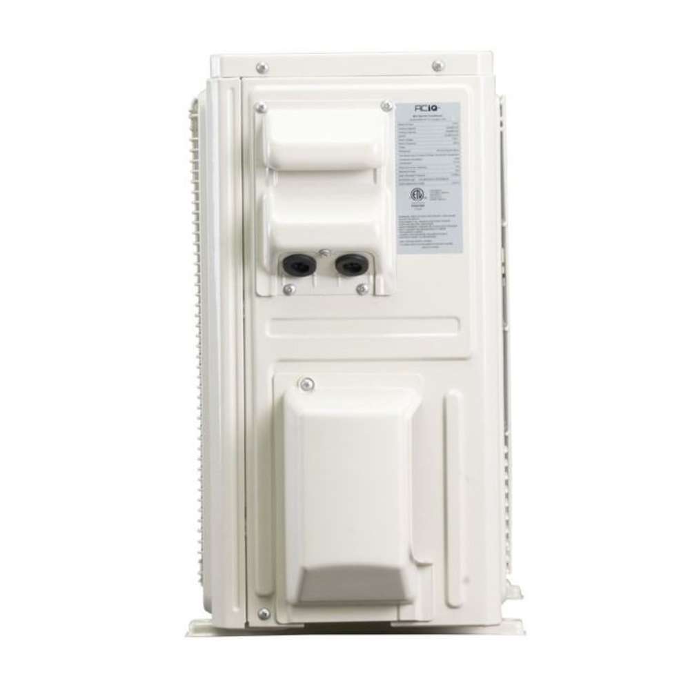 Shown from the side, ACiQ 9000 BTU Essentials 21 SEER2 Single Zone Wall Mount Mini Split Heat Pump System outdoor condenser has connection ports and a product label