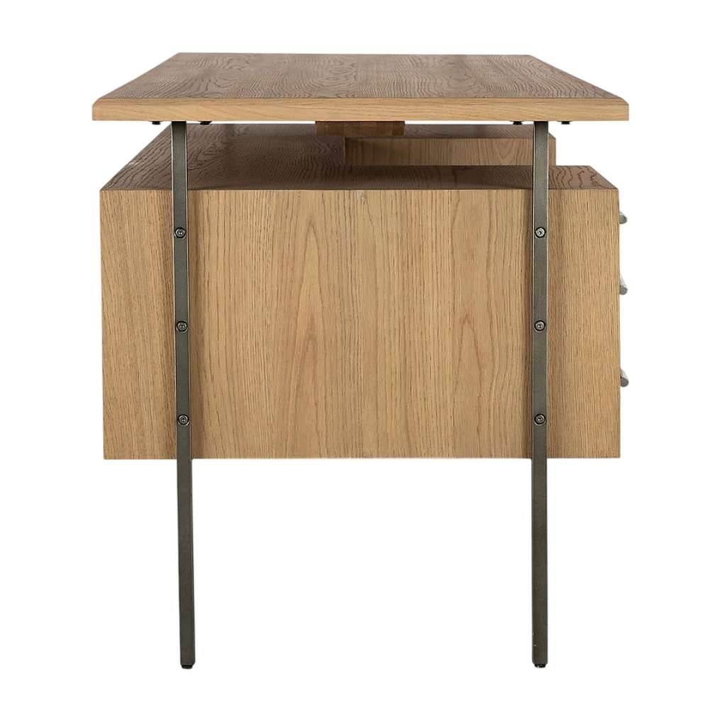 Shown from the side, Crate & Barrel Sedgwick Solid Oak Wood Desk with Storage highlights its slim metal frame and floating desktop