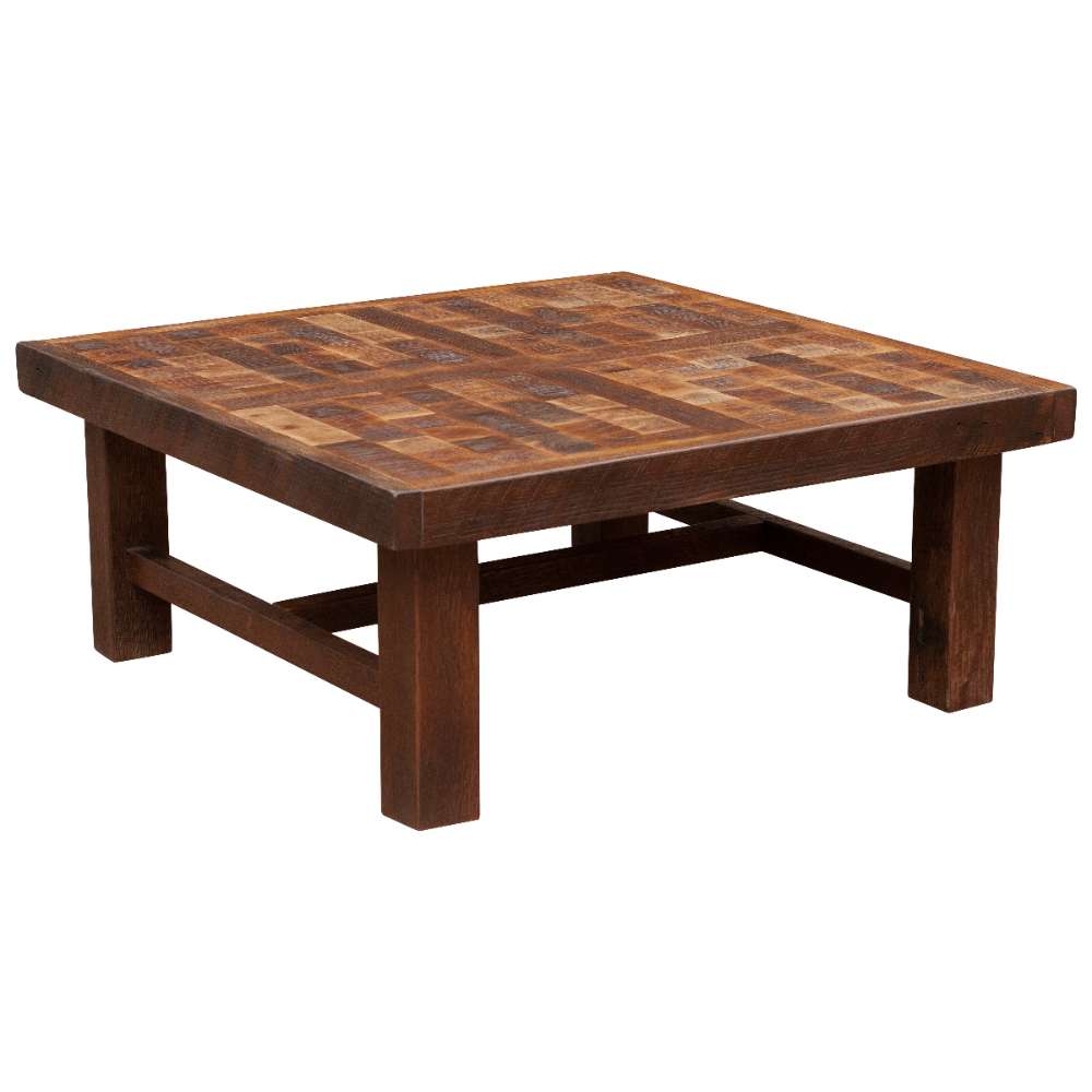 Side-angle view of Fireside Lodge Barnwood Americana Coffee Table - 42 Inch emphasizing its thick tabletop, solid wooden legs, and warm rustic charm