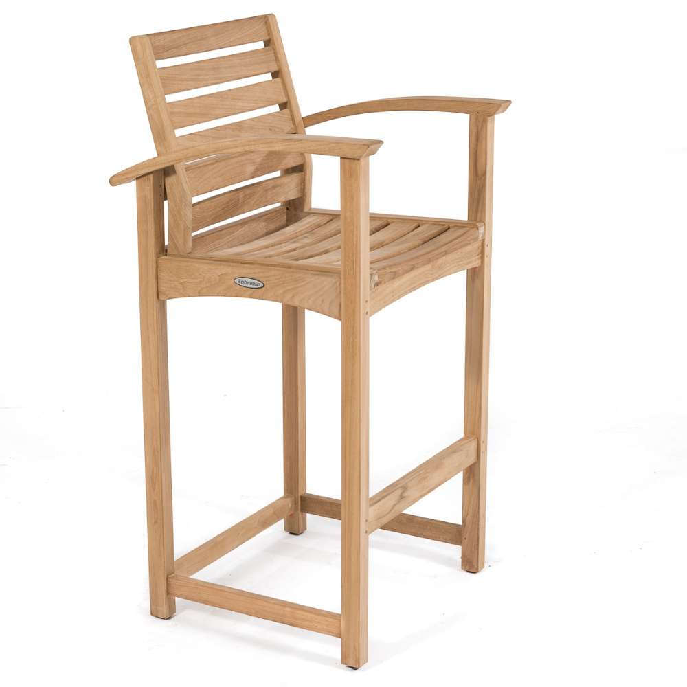Side-angled view highlights the sturdy legs, footrest, and slatted seat of a teak bar stool from Westminster Teak Somerset 5pc Teak High Bar Set