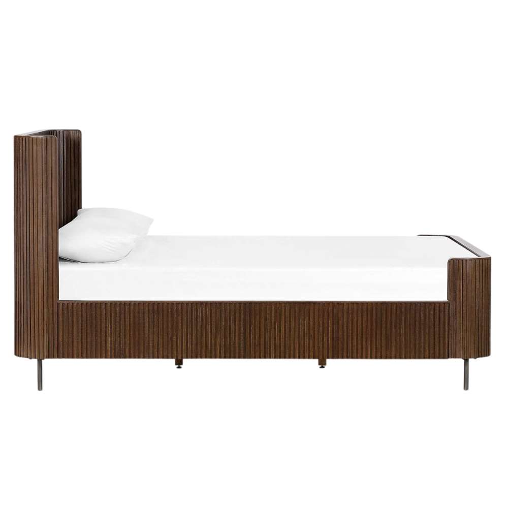 Side profile of Crate & Barrel Baylor Brown Ribbed Solid Oak Wood Queen Bed showcases the tall headboard, low footboard, and textured ribbed oak panels