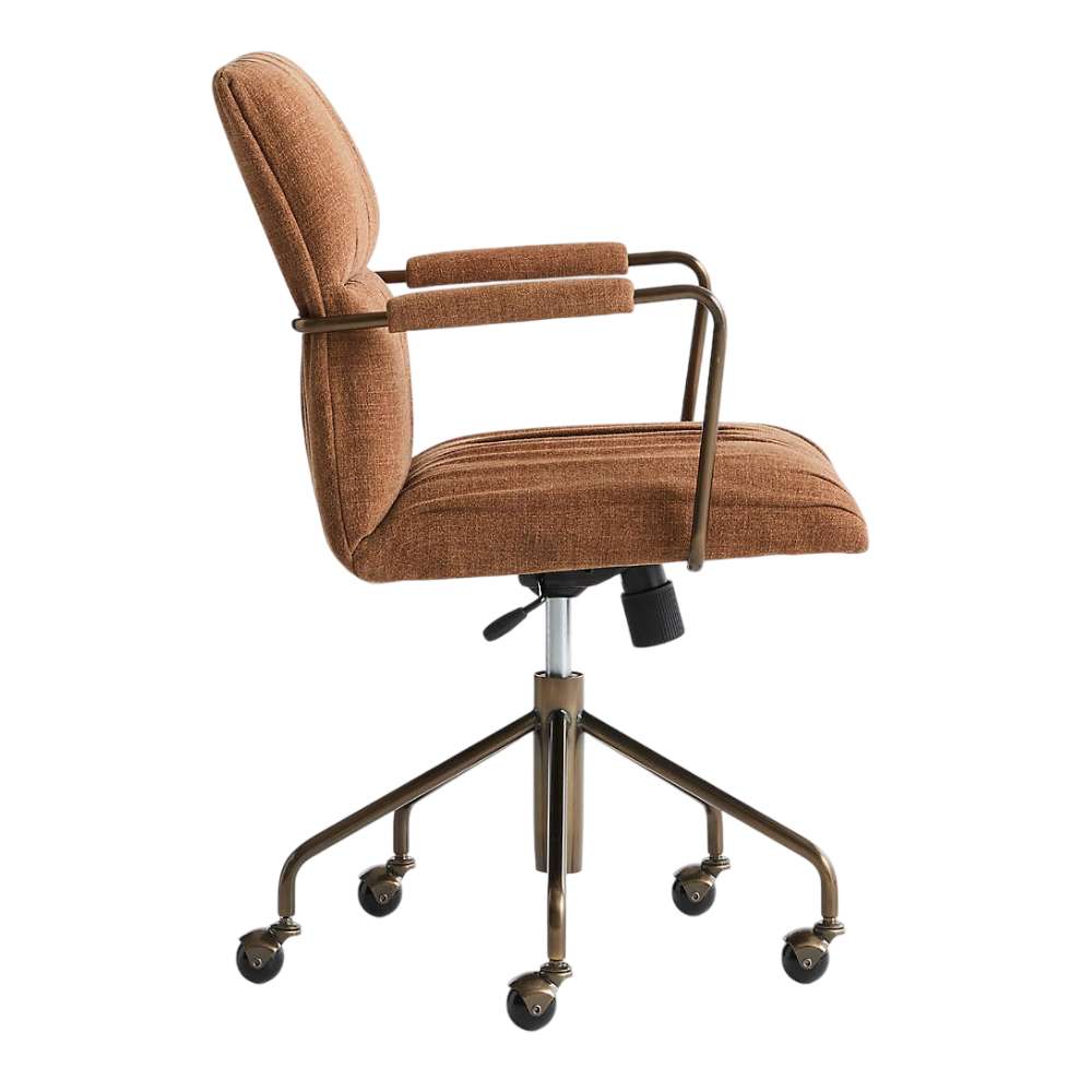 Side profile of Crate & Barrel Draper Ginger Upholstered Office Chair highlighting its cushioned seat, supportive backrest, and caster wheels