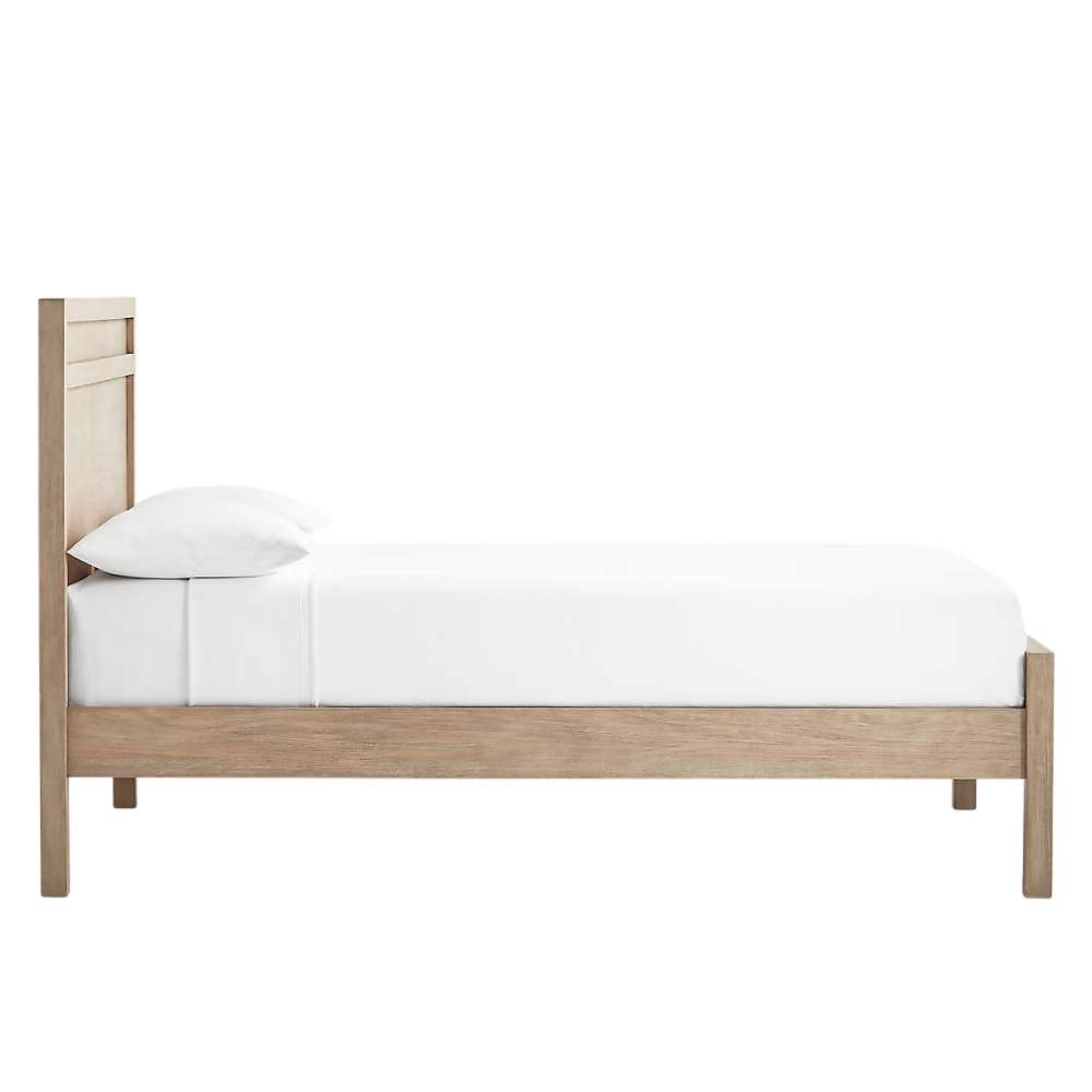 Side profile of Crate & Barrel Keane Weathered Natural Solid Wood Queen Bed showing the clean-lined wood frame and tall headboard