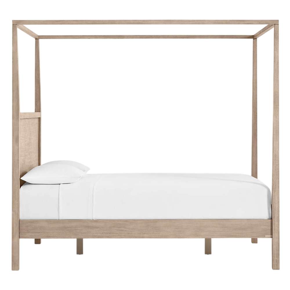 Side profile of Crate & Barrel Keane Weathered Natural Solid Wood Queen Canopy Bed showing the tall canopy frame and clean, minimalist design