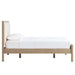 Side profile of Crate & Barrel Keane Weathered Natural Wood Upholstered Queen Bed showing its upholstered headboard, footboard, and sturdy wood frame