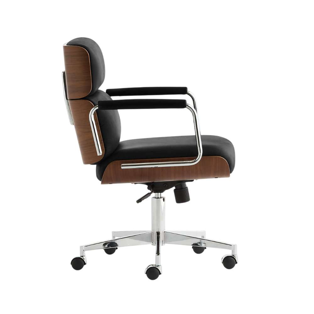 Side profile of Crate & Barrel Palmer Upholstered and Wood Paneled Office Chair with black leather seating, wood paneling, and a rolling base