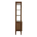 Side profile of Crate & Barrel Tate Walnut Bookcase File Cabinet showing its slim footprint, tall shelving frame, and enclosed storage section