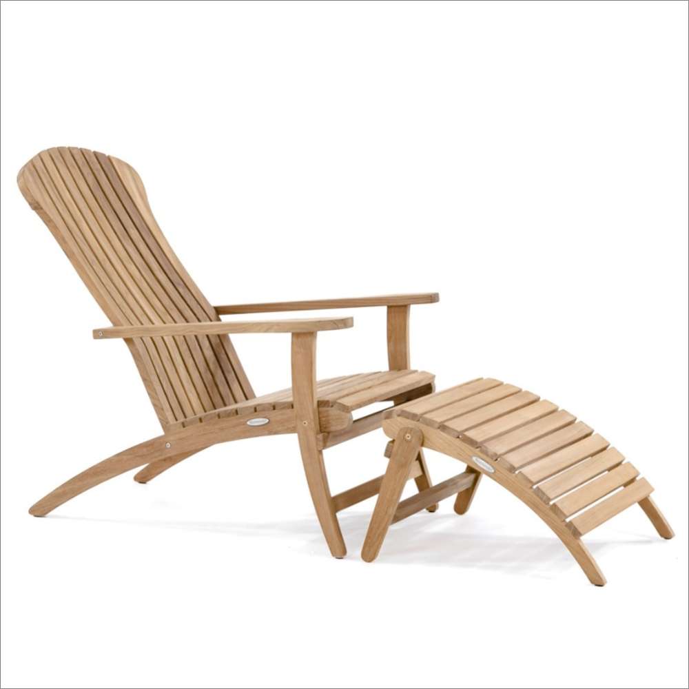 Side profile of Westminster Teak Adirondack Lounger and Ottoman showing the reclined teak chair and matching slatted footrest