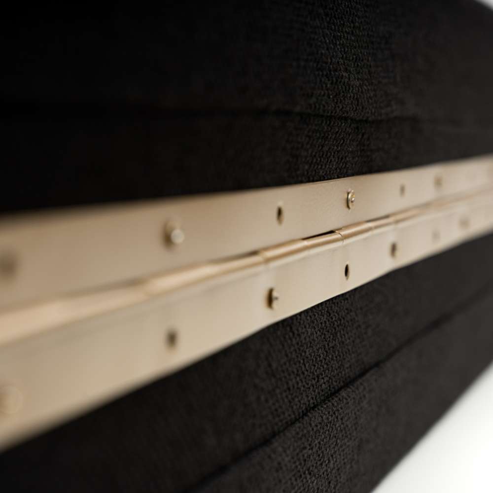 Side view highlighting the brass hinge hardware and textured black surface of GIK Acoustics ScreenPanel Vocal Screen
