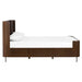 Side view of Crate & Barrel Baylor Brown Ribbed Solid Oak Wood King Bed highlights its ribbed oak panels, tall headboard, and sleek modern profile