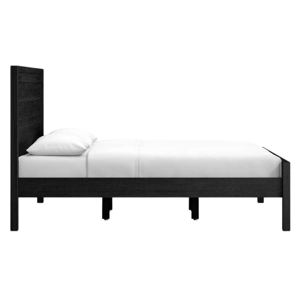 Side view of Crate & Barrel Keane Black Solid Wood King Bed showing its low-profile frame, tall headboard, and sturdy support legs
