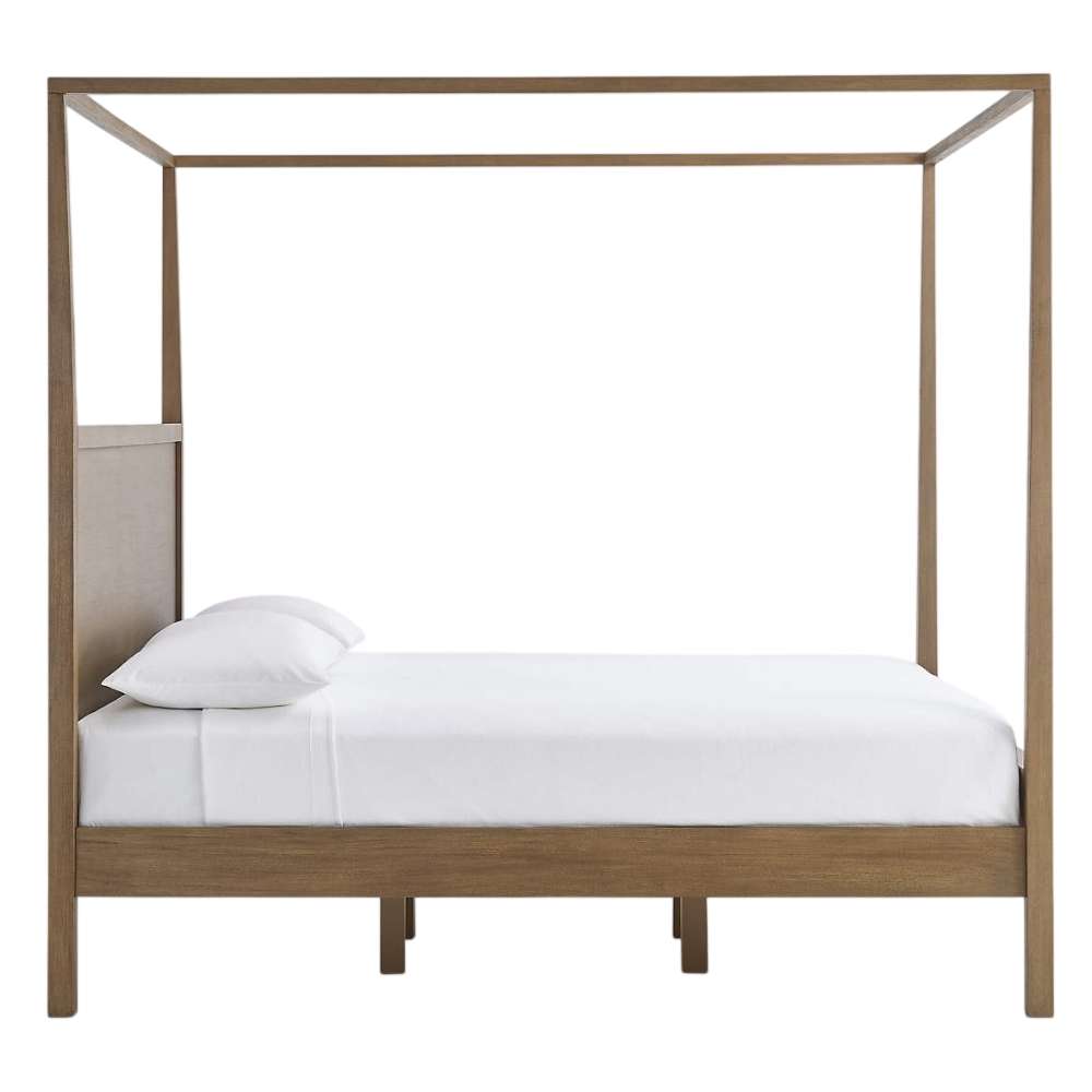 Side view of Crate & Barrel Keane Solid Driftwood King Canopy Bed shows the tall canopy frame, solid headboard, and low-profile platform design