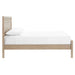 Side view of Crate & Barrel Keane Weathered Natural Solid Wood King Bed showing its low-profile frame and straight wood legs