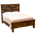 Side view of Fireside Lodge Barnwood Americana Bed fully dressed with pillows and a blanket