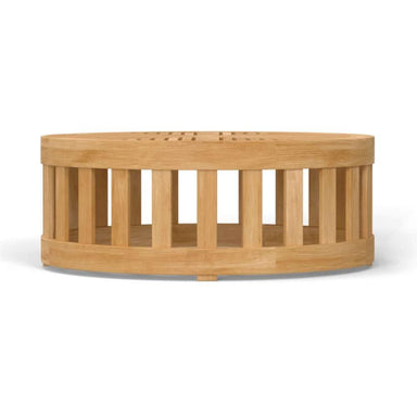 Side view of Westminster Teak 36-Inch Kafelonia Teak Coffee Table with a low profile, smooth teak frame, and open slatted sides