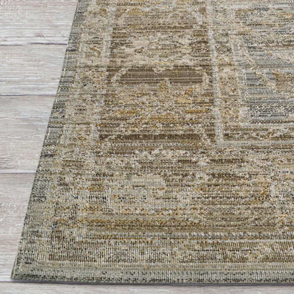 Side corner view of Couristan Fez Indoor/Outdoor Rug - Palais/Storm Grey highlighting its intricate, faded pattern with warm earth accents