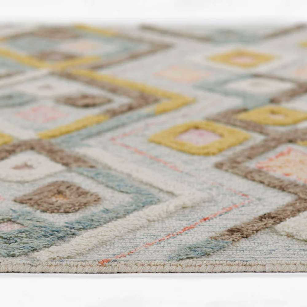 Side profile of Momeni Allegro Indoor Rug - ALL-3 Multi displays its low pile height and soft geometric accents
