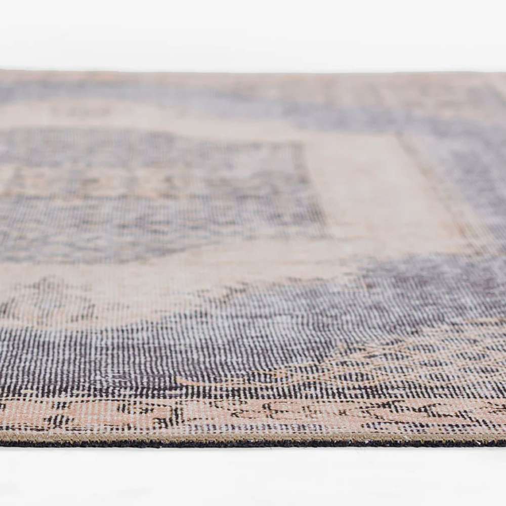Side view of Momeni Afshar Indoor Rug - AFS35 Denim displays its thin, low-profile design