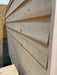 Side view of Sawmill Structures Box Sauna showing its sleek overlapping wood panels for a weather-resistant finish