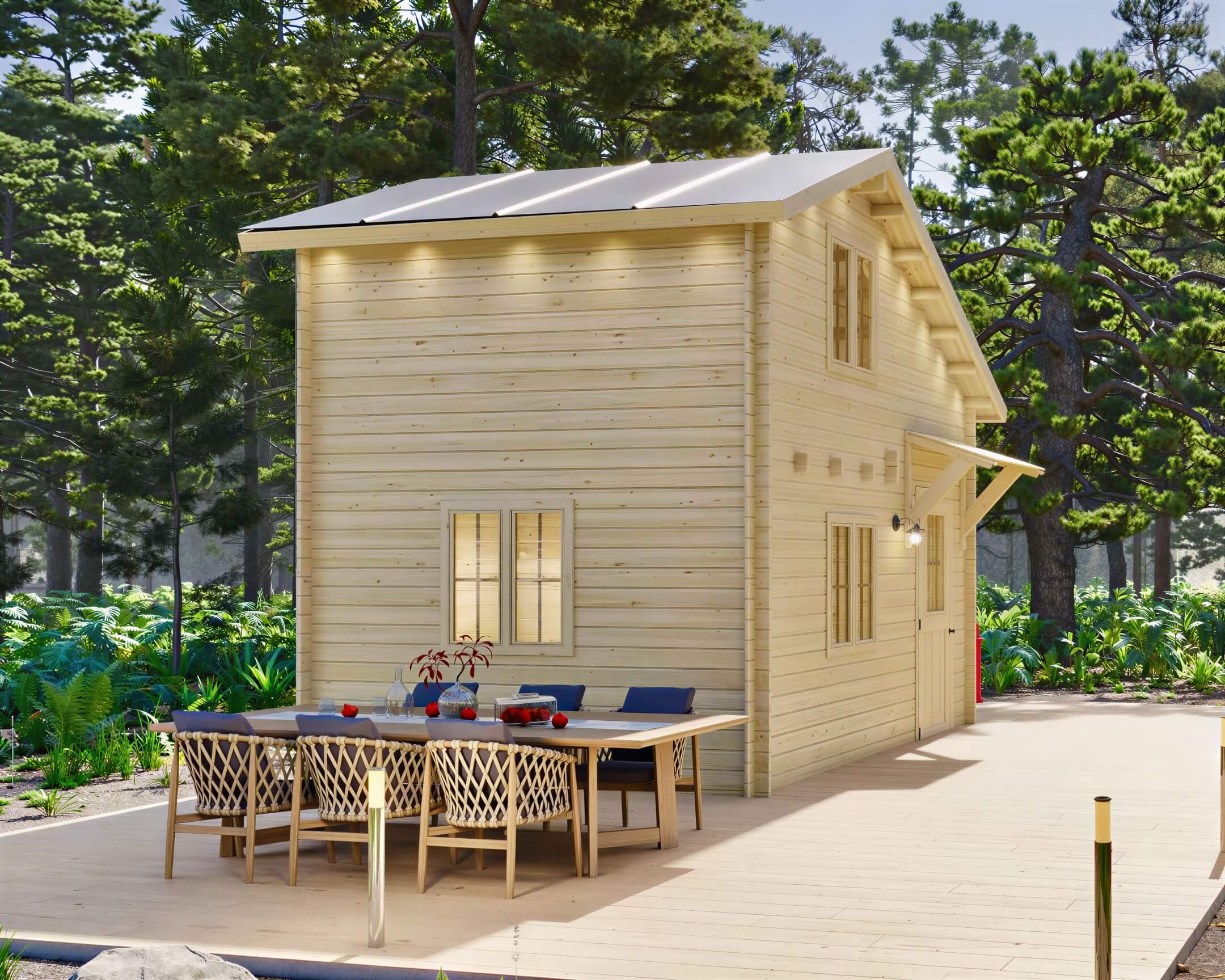 Side view of the Sawmill Structures BlueWater Loft 160 38mm Garden Room reveals its large windows, modern roofline, and a long outdoor dining table on the deck