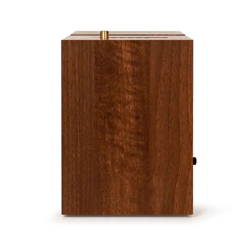 Side view of the Crosley S200 Stereo Powered Speakers - Walnut emphasizes the smooth walnut wood texture