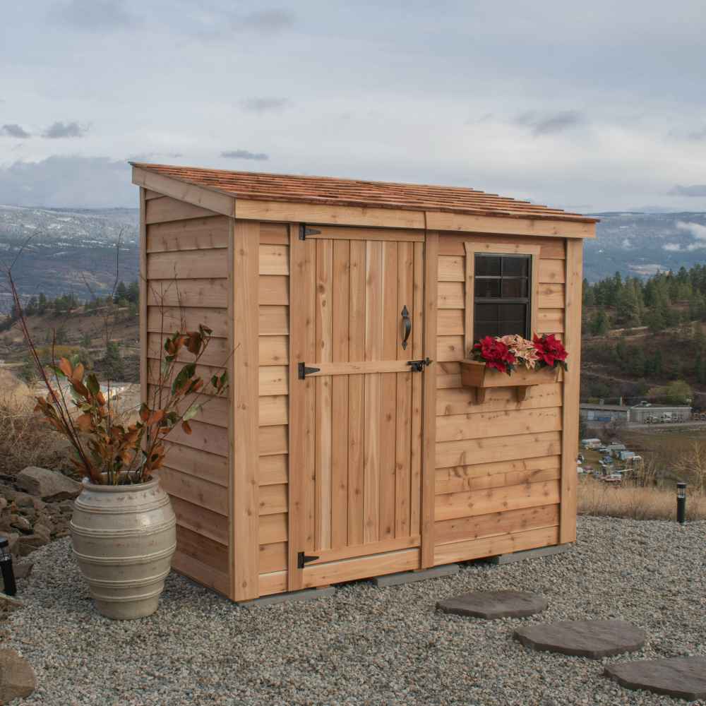 Single Door Cedar Roof Outdoor Living Today 8×4 SpaceSaver Lean-To Cedar Shed seen with a festive flower box under the window and rustic cedar siding next to a large ceramic planter