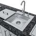 Sink area of Sunstone Magnolia 10ft Outdoor Kitchen Island Package showing faucet, basin, and countertop workspace