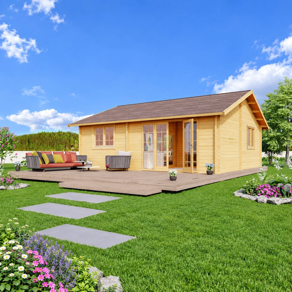 Skive 70 wooden garden room with a spacious furnished deck, large glass doors and colorful flower beds in a sunny backyard.
