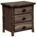 Slate Fireside Lodge Log XL Three Drawer Nightstand is a dark gray-toned nightstand with three drawers and rugged log corner posts