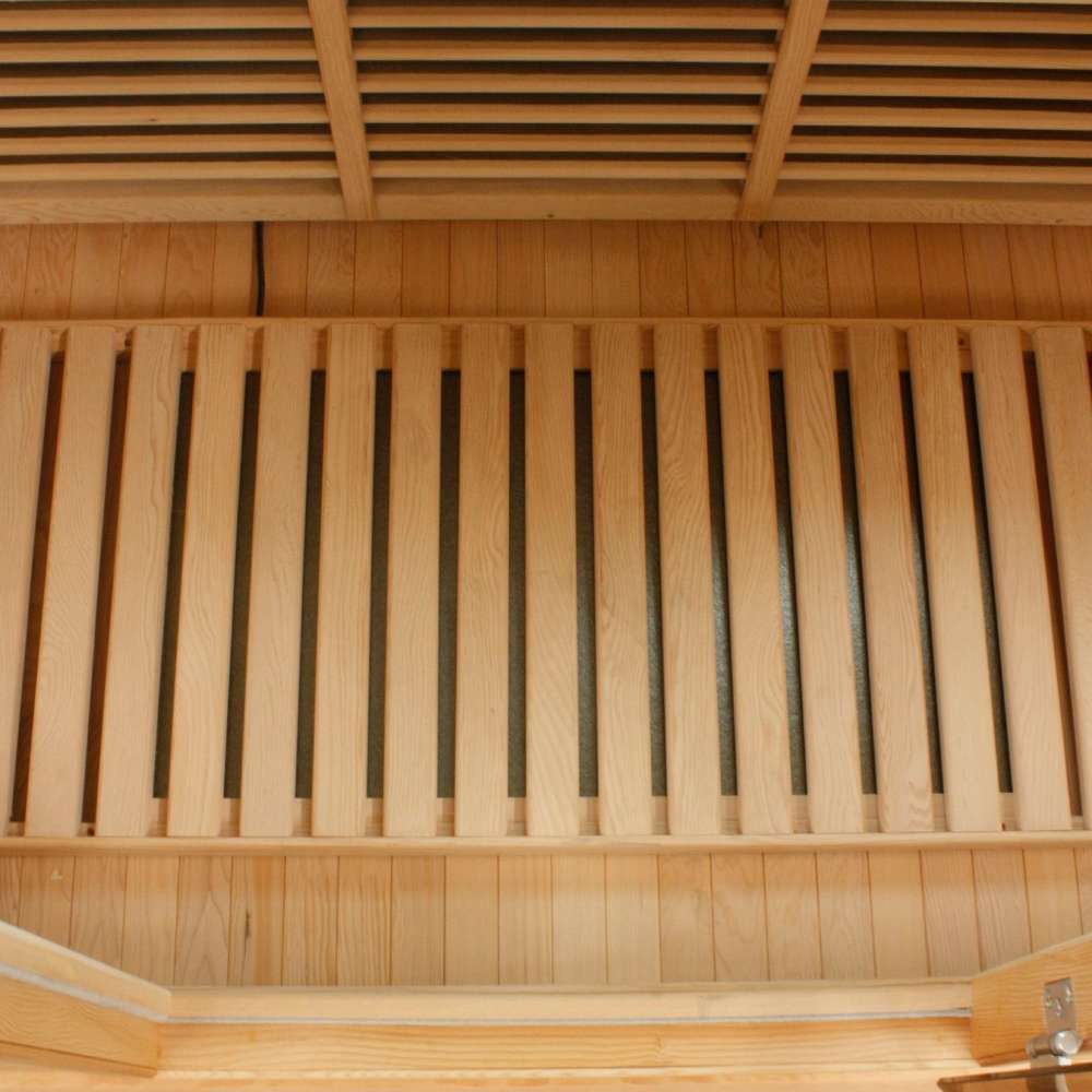 Slatted floor heater set on the cabin floor of Golden Designs Maxxus 3 Person Low EMF Far Infrared Corner Sauna in Hemlock