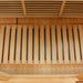 Slatted floor heater set on the cabin floor of Golden Designs Maxxus Avignon 3 Person Corner Near Zero EMF Far Infrared Sauna in Red Cedar