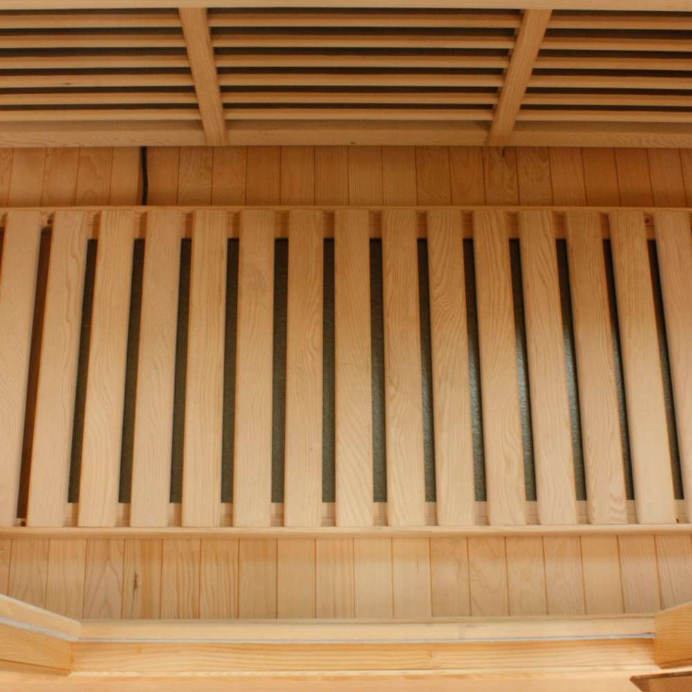 Slatted floor heater set on the cabin floor of Golden Designs Maxxus Chaumont 4 Person Near Zero EMF Far Infrared Sauna in Red Cedar