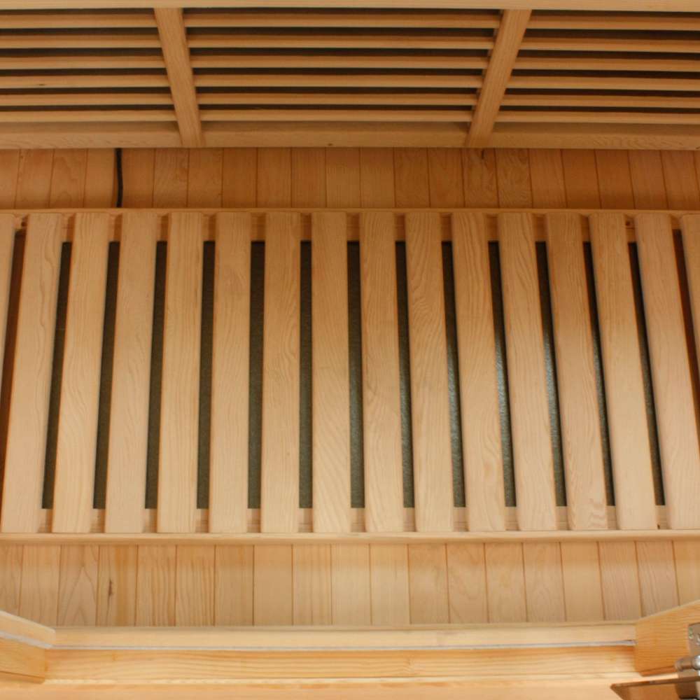 Slatted floor heater set on the cabin floor of Golden Designs Maxxus Montilemar 3 Person Near Zero EMF Far Infrared Sauna in Red Cedar