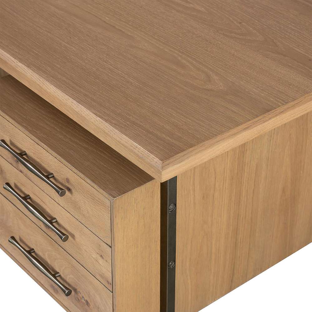 Smooth oak top and clean side profile of Crate & Barrel Sedgwick Solid Oak Wood Desk with Storage are shown in a close-up