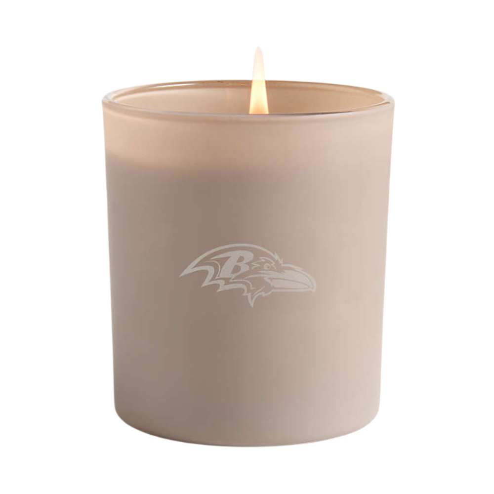 Soft amethyst single-wick Crate & Barrel Monochrome Scented Candle featuring a Baltimore Ravens logo on the front