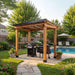 Spacious backyard view shows Outdoor Living Today Western Red Cedar 8x5 Grill Gazebo sheltering two grills near a pool with landscaping and patio seating