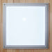 Square frosted ceiling light set in the wood roof of Golden Designs Maxxus 3 Person Low EMF Far Infrared Corner Sauna in Hemlock