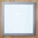 Square frosted ceiling light set in the wood roof of Golden Designs Maxxus 4 Person Low EMF Far Infrared Sauna in Hemlock