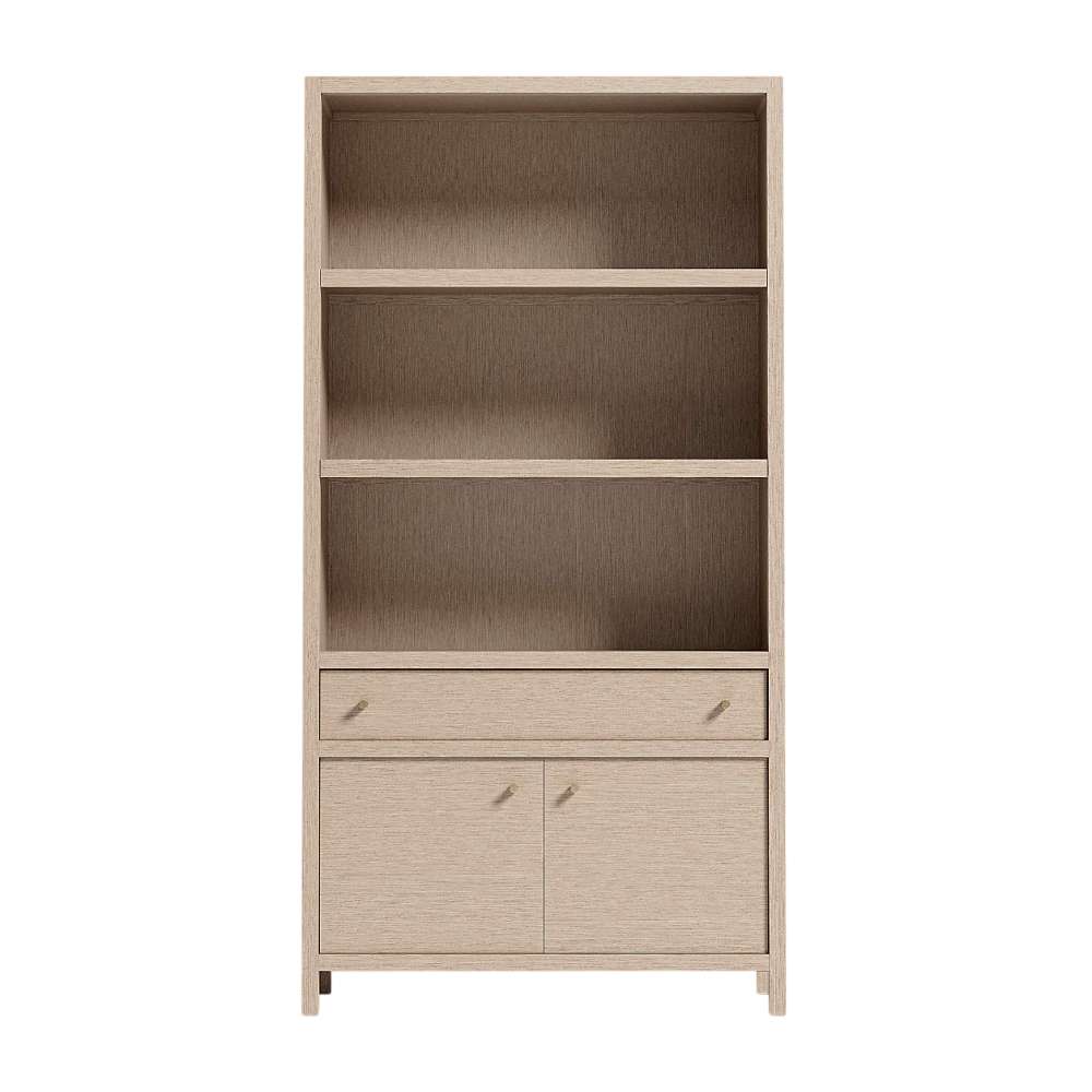 Straight-on view of Crate & Barrel Keane 40" Weathered Natural Wood Storage Bookcase displaying open shelves, a drawer, and a lower cabinet with closed doors