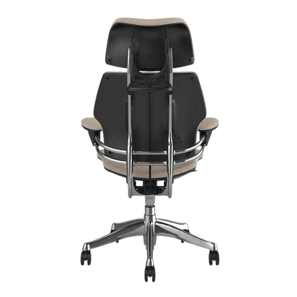 Straight rear view of Crate & Barrel Humanscale® Freedom Headrest Natural Linen Office Chair with exposed back support, armrests, and five-wheel base