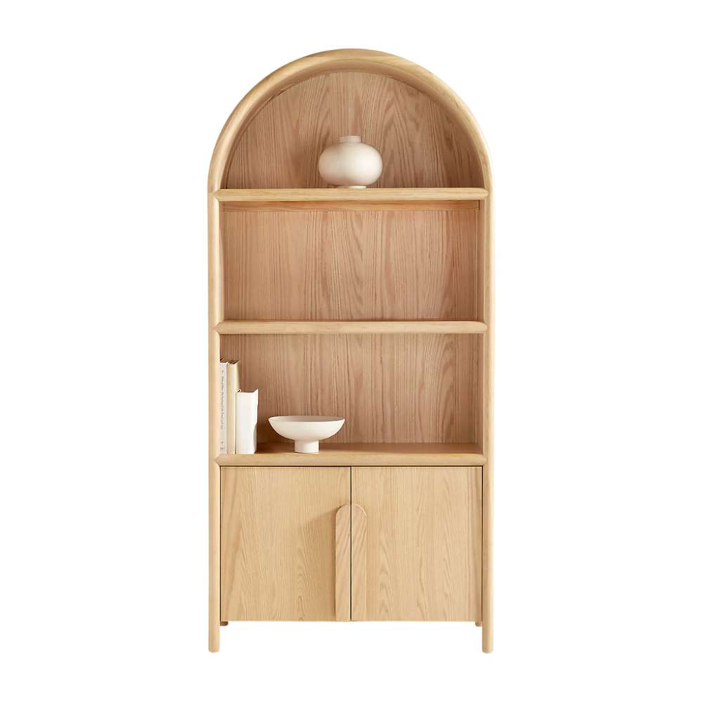 Styled Crate & Barrel Annie 38" Natural Wood Storage Bookcase with Shelves displaying decorative objects and books on open shelves