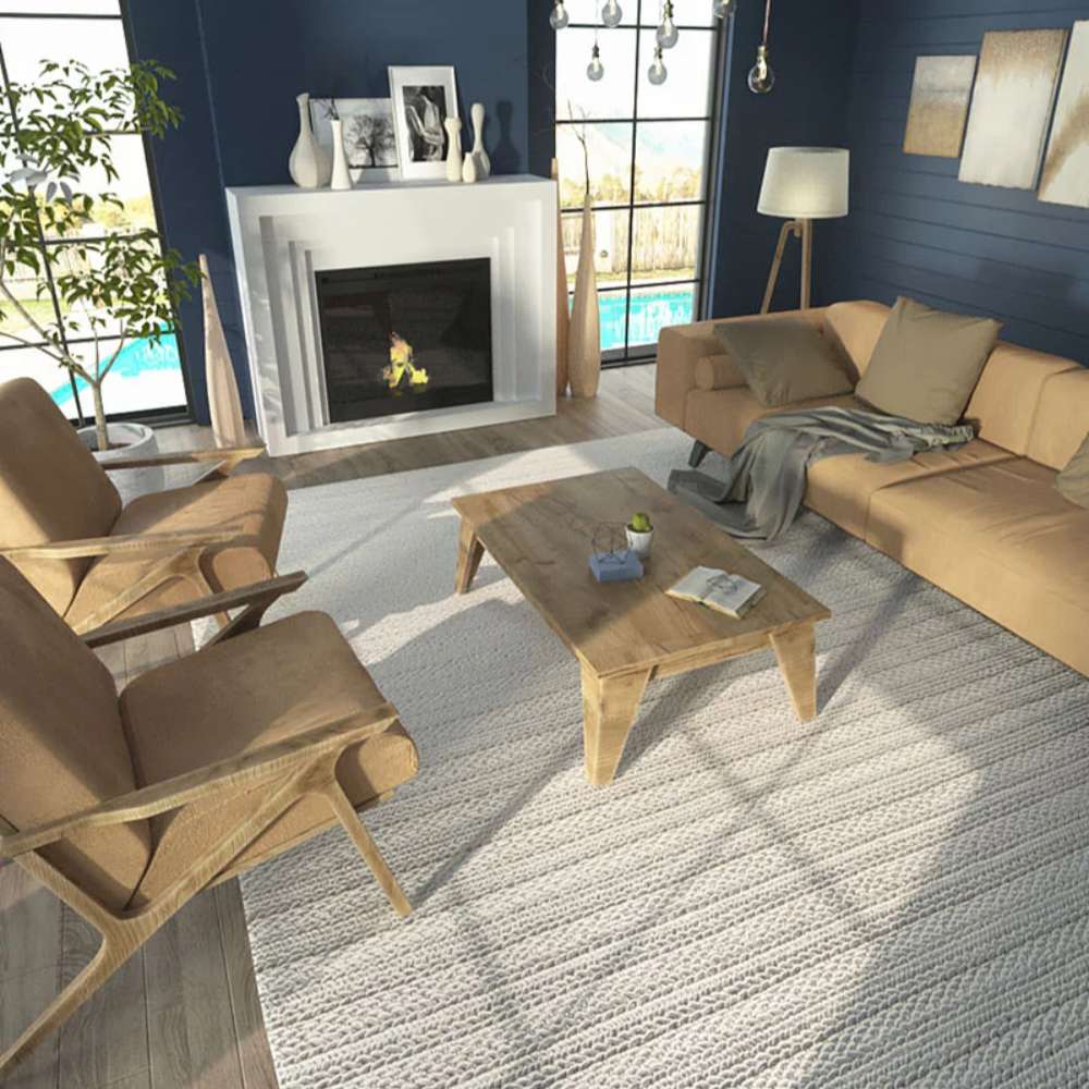 Styled in a bright living room, the Momeni Andes Indoor Rug - AND-9 Ivory creates a soft foundation under warm-toned furniture