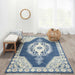 Styled in a bright room, the Momeni Anatolia Indoor Rug - ANA-3 Navy brings elegance with its navy and cream geometric patterns