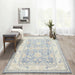 Styled in a bright room with a bench and vases, the Momeni Anatolia Indoor Rug - ANA-7 Light Blue brings a soft, classic touch