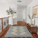 Styled in a hallway, Momeni Anatolia Indoor Rug - ANA-10 Ivory adds a touch of classic charm and warmth to wood flooring